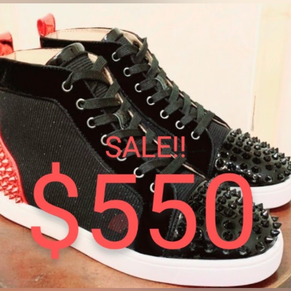 Christian Louboutin black/red spikes.  ON SALE